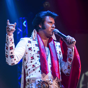 Travis Powell performing as Elvis